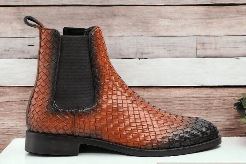 Experience comfort and style with our Awesome Handmade Men's Brown Woven Leather Chelsea Boots. Made with expert craftsmanship, these boots are both fashionable and durable. The woven leather adds a touch of sophistication, while the ankle height provides versatility for any occasion. Elevate your wardrobe with our men's fashion dress ankle boots.