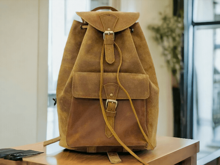 Crafted from full grain high quality genuine leather, this back bag combines durability and style. Perfect for the fashion-forward individual, it offers the highest quality material for a sleek and professional look. Stay organized and add luxury to your daily commute with this stylish bag.