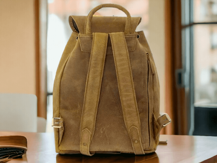 Crafted from full grain high quality genuine leather, this back bag combines durability and style. Perfect for the fashion-forward individual, it offers the highest quality material for a sleek and professional look. Stay organized and add luxury to your daily commute with this stylish bag.