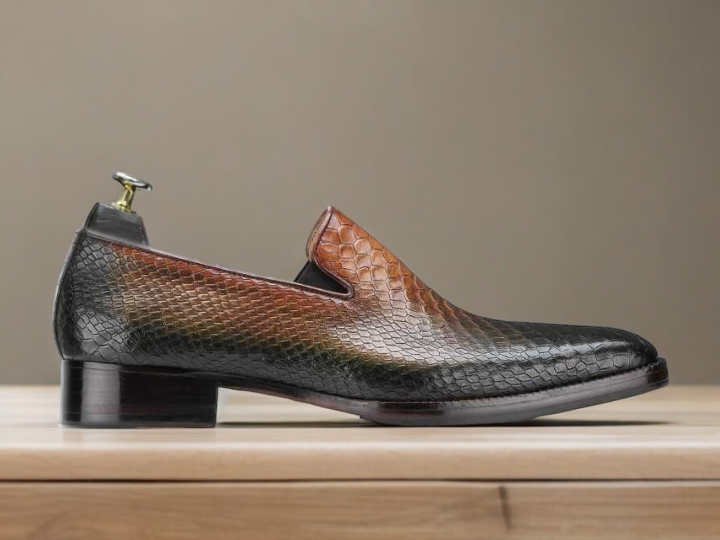 Discover the perfect blend of style and sophistication with our Awesome Designer Men's Handmade Brown Python Textured Leather Loafers. These men's dress shoes are crafted from high-quality leather, featuring a unique python texture for a luxurious touch. Perfect for formal parties and events, these loafers are sure to make a statement.