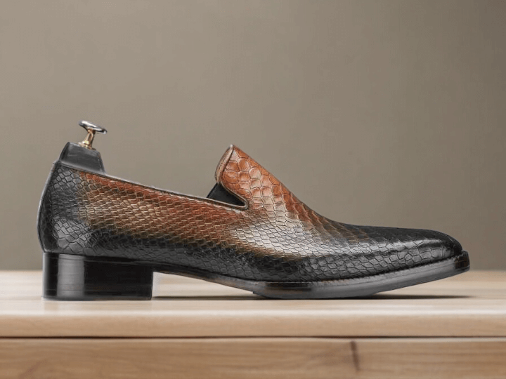 Discover the perfect blend of style and sophistication with our Awesome Designer Men's Handmade Brown Python Textured Leather Loafers. These men's dress shoes are crafted from high-quality leather, featuring a unique python texture for a luxurious touch. Perfect for formal parties and events, these loafers are sure to make a statement.