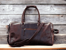 This premium sports duffle bag is made of full grain high quality genuine leather, ensuring durability and style. With its spacious interior and multiple compartments, it offers convenient storage for all your sports equipment. Perfect for athletes and fitness enthusiasts, this bag combines practicality with luxury.