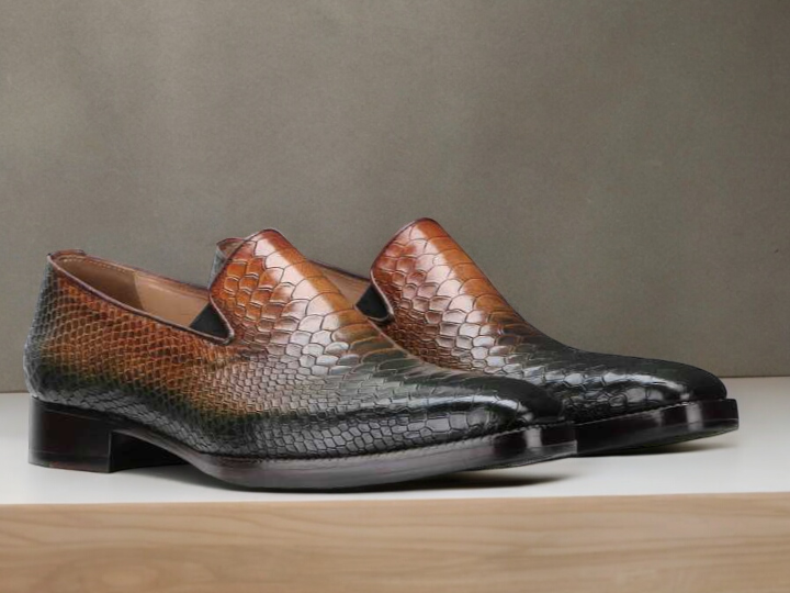 Discover the perfect blend of style and sophistication with our Awesome Designer Men's Handmade Brown Python Textured Leather Loafers. These men's dress shoes are crafted from high-quality leather, featuring a unique python texture for a luxurious touch. Perfect for formal parties and events, these loafers are sure to make a statement.