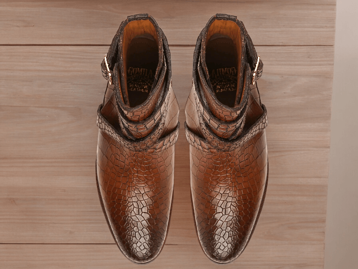 Elevate your style with these Awesome Handmade Men's Brown Python Textured Leather Jodhpur Boots. Handcrafted with meticulous attention to detail, these boots exude sophistication and luxury. The python texture adds a unique touch, while the ankle height provides both support and comfort. Perfect for any fashion-forward man.