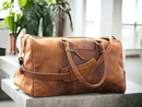 This high-quality genuine leather sports duffle bag is a must-have for any athlete or traveler. Made with the finest materials, it offers durable and stylish storage for all your essentials. Its spacious design and multiple pockets provide practicality and convenience, making it the perfect companion for any adventure.